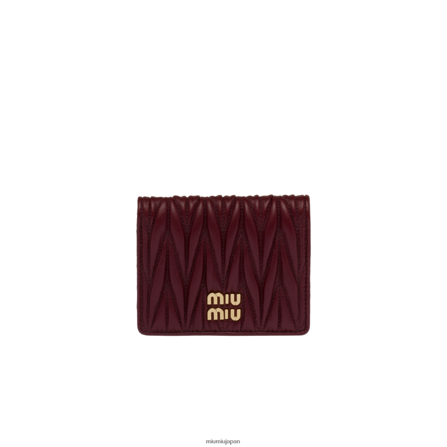 スモールマトラッセナッパレザーウォレット Miu Miu アマランサスレッド/メイズイエロー コレクション D2466R1070