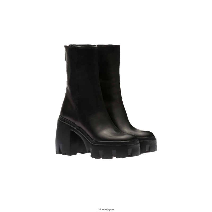 革のブーツ Miu Miu 黒 靴 D2466R339